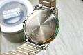 CASIO GOLDEN DIAL WITH DATE & GOLDEN & SILVER BRACELET WOMEN'S WATCH - LTP-V004SG-9AUDF. 