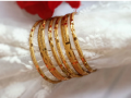 Artificial Golden Bangles (Guaranteed) with necklace. 