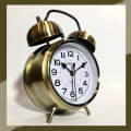 Loud Twin Bell Alarm Clock Battery Operated Silver Round Shape with Night Vision Dial. 