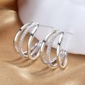 Huitan Silver Color Claws Stud Earrings with Crystal AAA CZ Stone Modern Design Fashion Versatile Accessories Women 2022 Jewelry. 