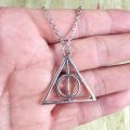 Deathly Hallows necklace (Harry Potter). 