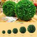 "Vibrant Plastic Artificial Grass Ball: Perfect for Indoor & Outdoor Decor". 