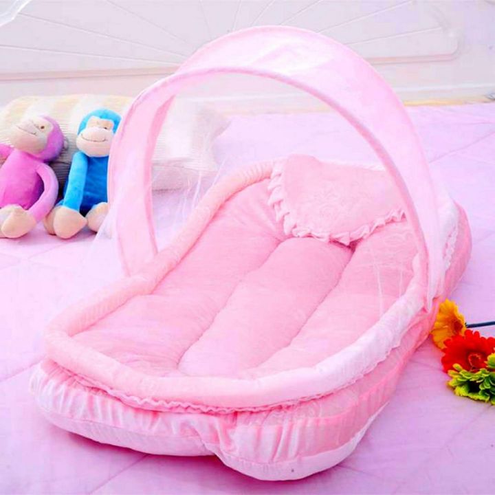 Baby Sleeping Bed In Pink Color With Net To Protect Mosquitos And Other Bugs