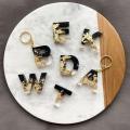Initial keychain- Black and golden-  fancy keychain- Resin-  Epoxy - Matt Black Color. 