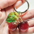 Vibrant Fruit Charms Keychain Colorful Red Fruit Key Chain Metal Resin Cherry Keychain for Purse Backpack. 