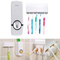 Fashion Automatic Toothpaste Dispenser Holder Bathroom Wall Mount Rack Bath. 
