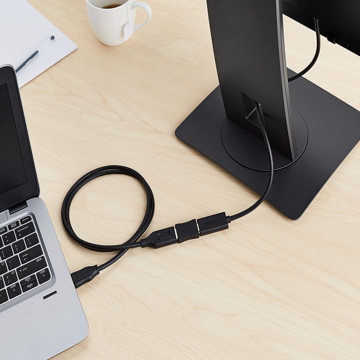 HDMI%20female/female%20coupler%20for%20connecting%20the%20two%20male%20ends%20of%20two%20HDMI%20cables%20to%20make%20a%20longer%20cable%20-%20Image%204