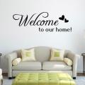 Welcome to Our Home Wall Sticker for Home  (12 by 24 inches). 