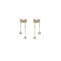 Korean fashion diamond studded bow earrings women's autumn and winter niche personality versatile long tassel stud earrings earrings trendy. 