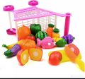 Toy shopping cart with baby toys. 
