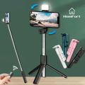 100% Imported Quality 4 In 1 Wireless Selfie Stick With Selfie Light Foldable Bluetooth Supported Mobile Stand Light Tripod Phone Holder For Live Streaming & Vlogging Stand Extendable Bluetooth Shutter Tripod Stand Photography Light.. 