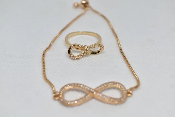 24%20carat%20Singapore%20gold%20plated%20women%20wrist%20Bracelet%20with%20bow%20tie%20%20shaped%20zerkone%20fitting%20with%20Ring%20-%20Image%203