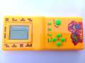Childhood Classic Fun Tetris Hand Held Electronic Game Toys Brick Game NEW | Kids Electronic Tetris Game Handheld Game Machine LCD Educational Toys | Kids Super 9999 in 1 Multi Color (Cell Operated). 