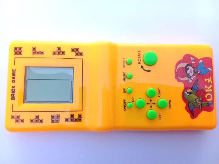 Childhood%20Classic%20Fun%20Tetris%20Hand%20Held%20Electronic%20Game%20Toys%20Brick%20Game%20NEW%20%7C%20Kids%20Electronic%20Tetris%20Game%20Handheld%20Game%20Machine%20LCD%20Educational%20Toys%20%7C%20Kids%20Super%209999%20in%201%20Multi%20Color%20(Cell%20Operated)%20-%20Image%203