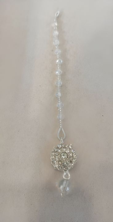 Get the Best Quality Elegant Silver Bindiya with Stone Work for Your Beautiful Baby Girl - Buy Now!