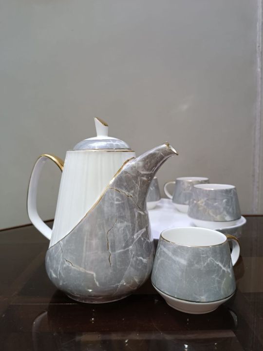 9%20%20Pcs%20Premium%20Quality%20%20Ceramic%20Grey-White-Gold%20Rotating%20Tea%20Set%20(Random%20Print)%20-%20Image%204