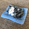 Kid Realistic Mew Sound Cat Sleeping in Nest Activated Carbon Plush Toy Car Decor. 