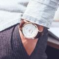 MREURIO Casual Couple Watch Luxury Quartz Leather Watch Lovers Wristwatch For Men Women. 