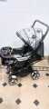 2 in 1 Handle 8 Big Wheels Pram For Kids With Food Tray Suitable For Newborn to 5 years Multicolors. 