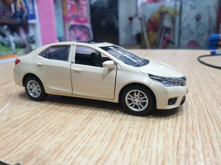 Toyota%20Corolla%20Grande%201:36%20scale%20diecast%20model%20toy%20car%20collection%20Random%20Color%20pull%20back%20action%20-%20Image%205