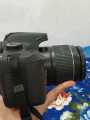 Canon EOS 4000D / Rebel T100 DSLR Camera with EF-S 18-55mm Zoom Lens + SanDisk 128GB Memory Card + Tripod + Case + Wideangle Lenses + Inspire Digital Cloth (20pc Bundle), Black, (Renewed). 