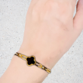 Elegant Gold-Plated Four-Leaf Clover Bangle with Black Enamel and Crystal Accents |stainless steel bracelet -Luxury Jewelry for Women |Best Gift for Girls. 