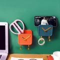 Wall-Mounted Multifunctional Clock Design Mobile Holder. 