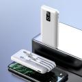 10000 MAH mini power bank 4 cable type 4in1 fast charging best quality power bank with cable for all phones. 