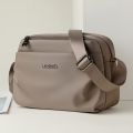 Stylish Solid Color Women’s Shoulder Bag – Large Capacity Multi-Pocket Crossbody with Painted Wide Strap for Daily Use. 