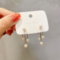Korean fashion diamond studded bow earrings women's autumn and winter niche personality versatile long tassel stud earrings earrings trendy. 