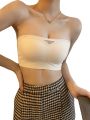 Summer new strapless underwear women's latex cotton inner cup inverted triangle openwork no mark glossy lift bra women's summer. 