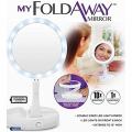 My Foldaway Mirror The Lighted, Double Sided Vanity Mirror 10x Magnification Portable Double-Sided Lighted Beauty Mirror• Double-sided mirror Extends to 13” high can be used with 4 x AA or adapter. 