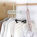Magic Hanger - 9 hole closet organizer - space saving magic plastic hangers - organizer 9 hole hangers for clothes paints trousers shirt hanger 9 in 1 hangers - Multi Purpose Hanger - Clothes Plastic Hanger - High Quality Hanger. 