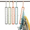 Cloths Organizer Magic Hanger | Multi-Function 9-Hole Rotatable Magic Smart Hanger | Cloths Organizer | Durable Eco-Friendly. 
