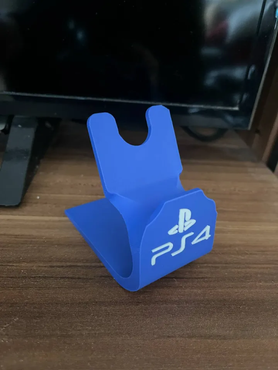 PS4%20Single%20Controller%20Stand%20%E2%80%93%20Compact%20Gaming%20Controller%20Holder%20&%20Organizer%20%7C%20Sleek%20Desk%20&%20Entertainment%20Setup%20Accessory%20for%20PlayStation%204%20Gamepads%20-%20Image%202