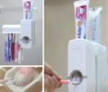 White Automatic Toothpaste Dispenser and Toothbrush Holder Set, Wall Mounted Hands Free Toothpaste Squeezer with 5 Brush Holder, Toothpaste Squeezing Machine. 