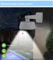 High-Tech Solar Security Light: LED Flood Lamp with Motion Sensor and Camera Simulation. 