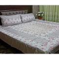 Patchwork bed sheets. 