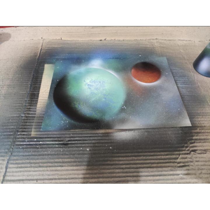Spray paint planet art painted on high quality glossy paper