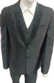 men three piece fancy black pentcoat suit. 