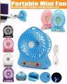 portable electric rechargeable handy cooling fan with rechargeable cell. 