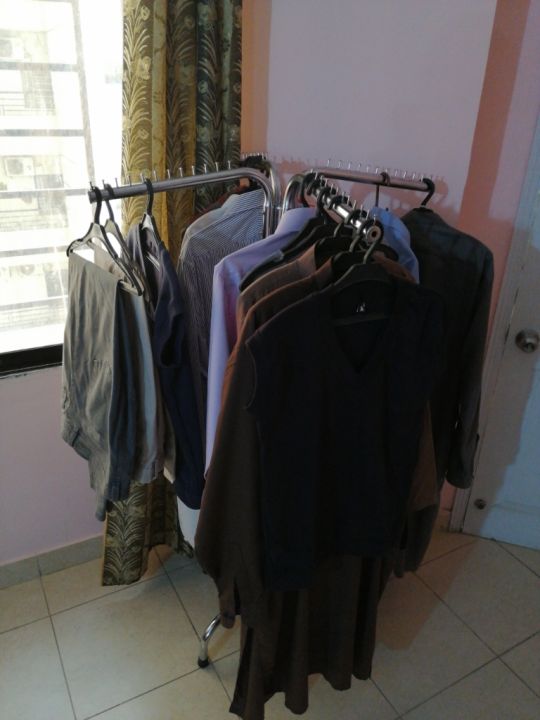 Rotating%20Boutique%20Display%20Stand%20Metal%20Clothes%20Rack%20for%20Hanging%20Shirts,%20Dresses,%20and%20Coats%20Ideal%20for%20Fashion%20Stores,%20Exhibitions,%20and%20Retail%20Outlets.%20-%20Image%202