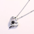 Eternal Affection Stainless Steel Heart Pendant Necklace with 100 Languages I Love You Display. 