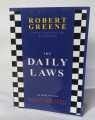 The Daily Laws: 366 Meditations on Power, Seduction, Mastery, Strategy and Human Nature by Robert Greene. 
