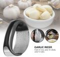 Manual Garlic Press Rocker with Handle Stainless Steel Garlic Crusher Squeezer Slicer Gadgets Tool For Garlic Paste. 