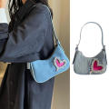 denim Shoulder bag Trendy blue Crescent moon bag Denim underarm bag for Evening events Night out Fashion shows Celebrities Fashion enthusiasts. 