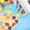 Colorful Geometric Shapes Learning Board For Montessori Kids. 