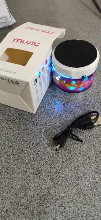 Mini%20Bluetooth%20Wireless%20Portable%20Speaker%20with%20LED%20Dancing%20Light%20&%20High%20Bass%20Sound%20For%20All%20Mobile%20With%20FM%20Multicolours%20-%20Image%204