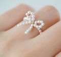 Beaded rings in different cute design butterfly,strawberry, heart, circle of flowers and in rabbit design. 