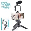 "Create Cinematic Vlogs: AY-49 Tripod Video Kit in Action". 